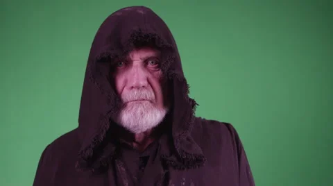 4K Hooded man's face twitches on green screen Stock Footage 45782976
