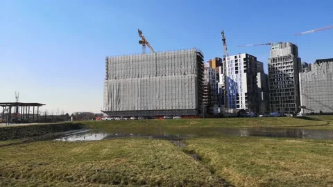 4k horizontal pan of big construction site in Milan, Italy Stock Footage 148846563