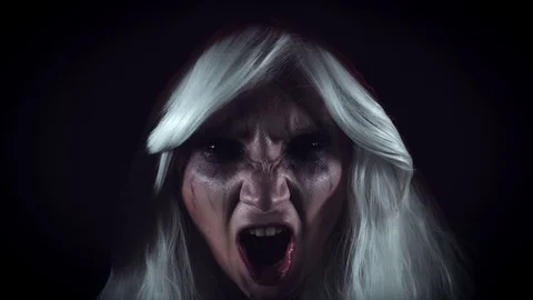 4K Horror Witch Appearing from Darkness Screaming Stock Footage 71484752
