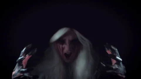 4K Horror Witch with Bloody Tears Shouting and Gesturing with Hands Stock Footage