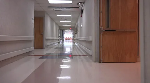 4K Hospital Hallways To Waiting Room Chairs ED Stock Footage