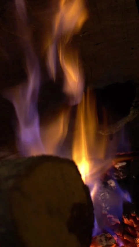 4K a hot roaring fire and red coals in a fireplace. Burning wood in chimney Stock Footage 312951299