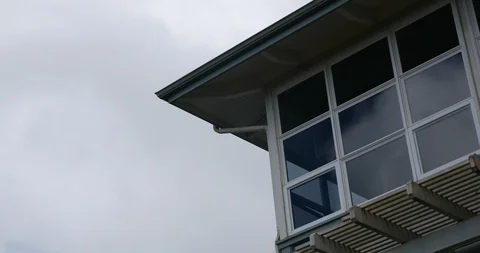 4K House windows with clouds close up Stock Footage 100100153