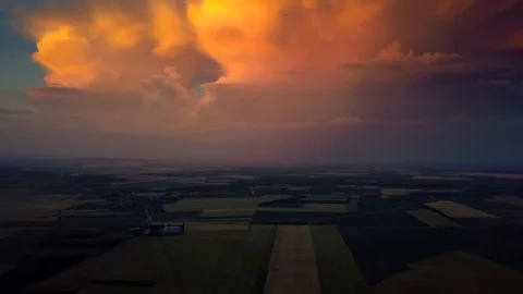 4K Huge colourful thunderstorm above Balatonfuzfo, Veszprem county at sunset Stock Footage 90953391