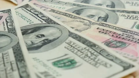 4k Hundred dollar bills spinning. Rotation paper money close-up. Background with Stock Footage 154625780