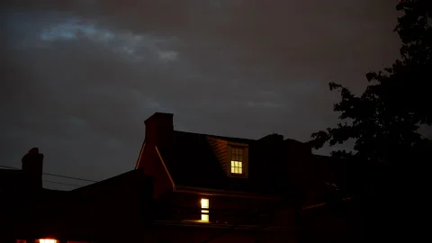 4K HYPER TIME LAPSE OF ROOF WITH STORM CLOUDS AND LIGHTENING Stock Footage 132070314