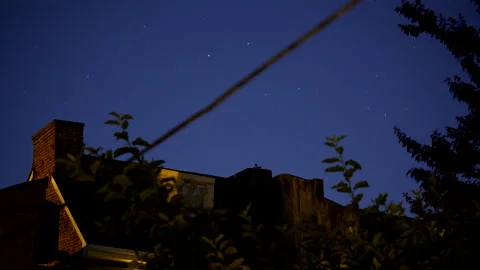 4K HYPER TIMELAPSE OF NIGHT SKY WITH STARS AND TREES Stock Footage 132573712