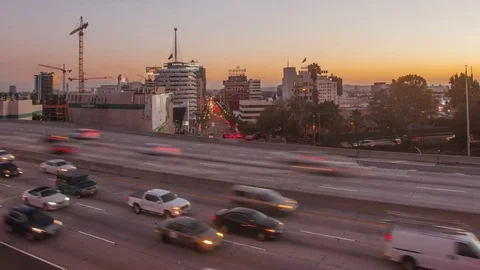 4K hyperlape of freeway traffic from day to night Stock Footage 70848151