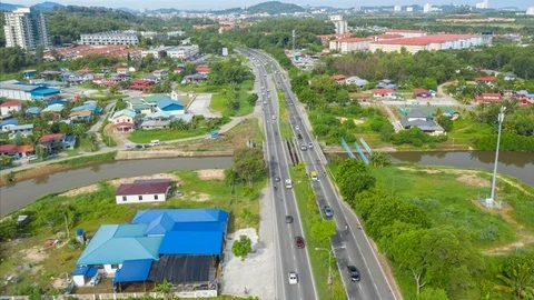 A 4K hyperlapse of car moving around Kota Kinabalu City Vidéo 111212307