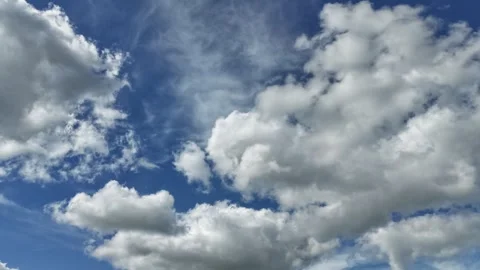 4K Hyperlapse Clouds Moving Across Blue Sky Stock Footage 337398475