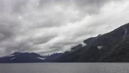 4K Hyperlapse Of Ferry Navigating A Fjord During Rain Stock Footage
