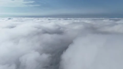 4K Hyperlapse Flight Above Dense Clouds and Blue Sky Stock Footage 337539031