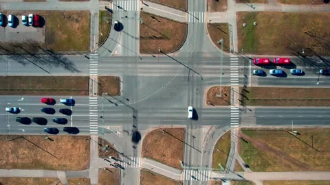 4K hyperlapse top view of a busy crossroad with traffic lights in a city Stock Footage 172447318
