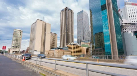 4k hyperlapse video of highway traffic and cityscape Stock Footage 67229951