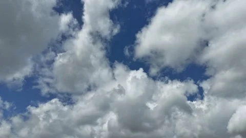 4K Hyperlapse of White Clouds Moving Across a Blue Sky Stock Footage 337889718