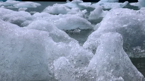 4K ICE CHUNKS FLOATING MELTING 4645 Stock-Footage 345100685