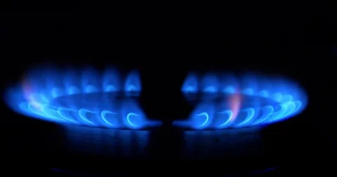 4K - Ignition of a blue flame on gas stove Stock Footage 105680921