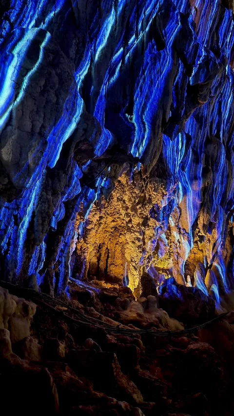 4K Illuminated Stalactites and Dramatic Limestone Cave Interior, Okinawa, Japan Stock Footage 345375713