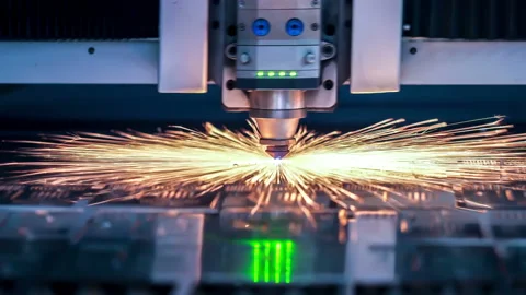 4K: Industrial laser cutter sheet metal with sparks. Stock Footage