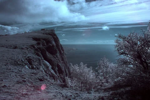 4K. InfraRed landscape: Movement of the clouds on the mountain Stock Footage 32295421