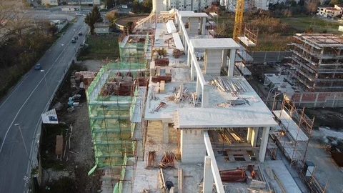 4K inside construction site aerial video at sunset Stock Footage 122694265