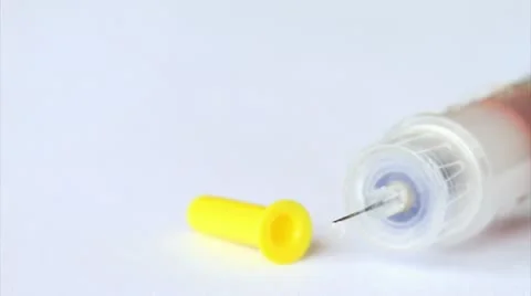 4k. Insulin Syringe Pen on the Table. Shot Slider. Stock Footage