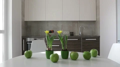 4K. Interior of modern kitchen in scandinavian style. Motion view with apples. Stock Footage 73580661