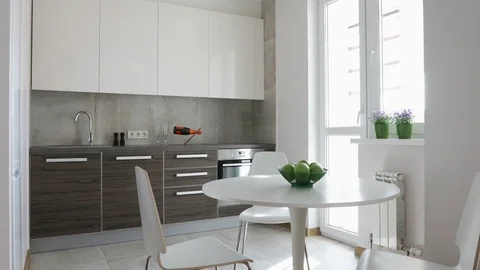 4K. Interior of modern kitchen in scandinavian style. Motion panoramic view. Stock Footage 80968486