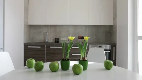 4K. Interior of modern kitchen in scandinavian style. Motion view with apples. Stock Footage 80982222
