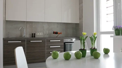 4K. Interior of modern kitchen in scandinavian style. Motion view with apples. Vídeo Stock 80988146