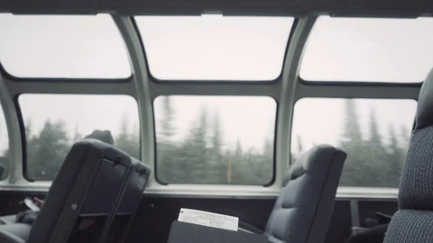 4k interior of a passenger train dome passing through a forest Stock Footage 97060232
