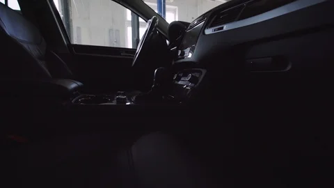 4k interior view of car with black salon, speedometer and steering wheel. View Stock Footage 95412950