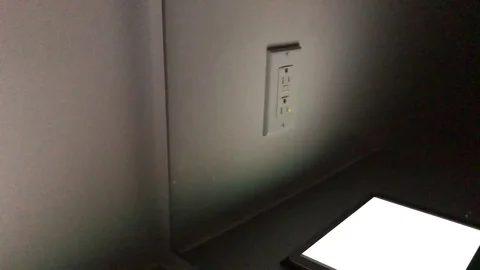 4K by iPhone X: Electric Outlet Reflected in Mirror in Low Light 動画素材 85141475