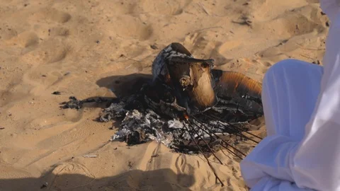 4K, irons inside a bonfire in the middle of the desert sand of Dubai Stock Footage 108380310