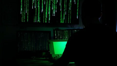4k IT programmer develops application for steeling private information on laptop Stock Footage 87182491