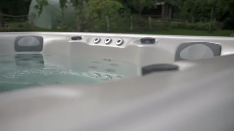 4K Jacuzzi Spa at home garden relaxing Stock Footage 296386489