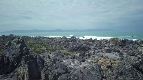 4k Jagged Rocks, Flying Through Turakirae Coast Video stock 81242283