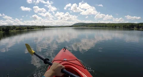 4K Kayaking on Lake Stockbeeldmateriaal 53533885