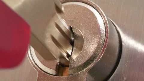 4K - Key is inserted into the keyhole and the lock is closed. Close-up Stock-Footage 163108998
