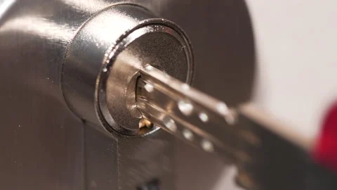 4K - Key opens high security cylinder lock. Close-up Stock Footage 162272694