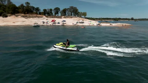 4K The lady run on jet ski over lake Stock Footage 134666863