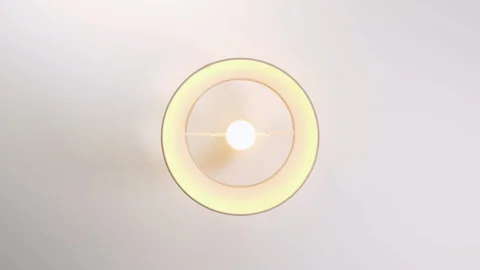 4K Lampshade with Bulb on white ceiling turned on and off, cinematic framing Stock Footage 88243780