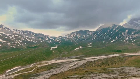 4k landscape of the mountains during a Cloudy day Stock Footage 282443968