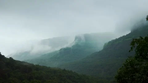 4K Landscape shot of dark clouds above the green Sahyadri hills  Vídeo Stock 311972038