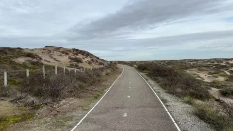 4K landscape video of flying over the bicycle path Stock Footage 320241047
