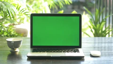 4K : A laptop computer with a key green screen set on work office table. Stock Footage 141346708