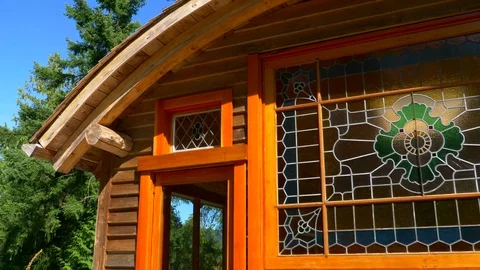 4K Large Stained Glass Pane in Coast Island Pacific Cabin Bright Sunshine Summer Stock-Footage 80564494