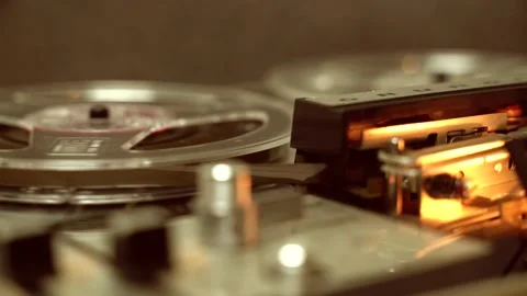 4k lateral view of an old reel to reel tape recorder. Close up shot Stock Footage 150059589