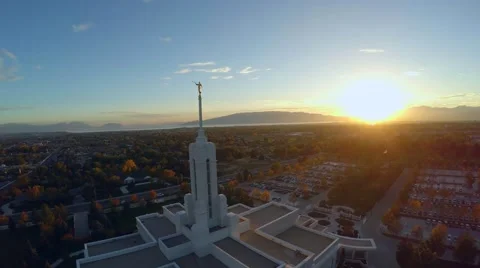 4K LDS Temple at Sunset Fly Back Stock Footage 42824516