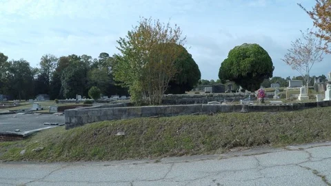 4k-Left To Right Pan-Cemetery-Steeple Headstone Stock Footage 98471693
